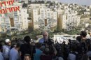 Israeli Housing Minister Ariel speaks to reporters at a ceremony announcing the resumption of construction of an Israeli neighbourhood in East Jerusalem