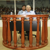 FILE - In this June 30, 2008 file photo, Ieng Sary, a former Khmer Rouge foreign minister, sits in the dock in the courtroom for a hearing at the U.N.-backed genocide tribunal in Phnom Penh, Cambodia. Ieng Sary, who co-founded Cambodia's brutal Khmer Rouge movement in 1970s, served as its public face abroad and decades later became one of its few leaders to face justice for the deaths of well over a million people, died Thursday morning, March 14, 2013. He was 87. (AP Photo/Pring Samrang, Pool, FIle)