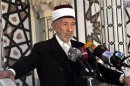 A file photo shows high-level cleric Mohammed al-Buti speaking at a mosque