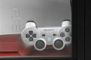 Sony's Playstation3 and its game controller are displayed at a showcase at an electronic shop in Tokyo