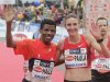 Ethiopian world marathon record holder Gebrselassie and Radcliffe of the UK wave after winning the half marathon race during the Vienna City Marathon in Vienna