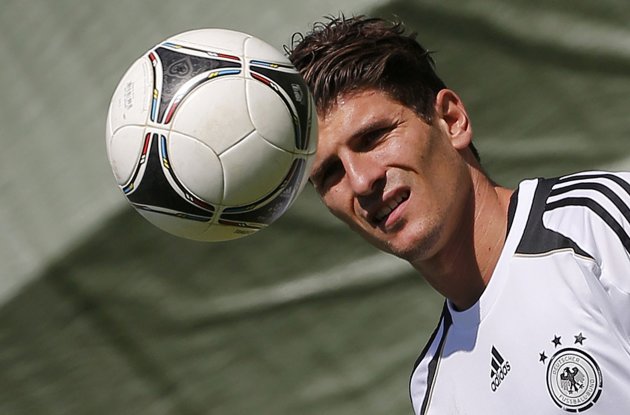 Germany's national soccer player Gomez eye ball during a training session in Gdansk