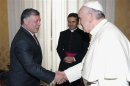 Pope Francis shakes hands with Jordan's King Abdullah during a private meeting at the Vatican