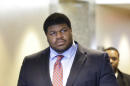 Former Dallas Cowboys NFL football player Josh Brent arrives at court for closing arguments in his intoxication manslaughter trial Tuesday, Jan. 21, 2014, in Waco, Texas. Lawyers wrapped up their closing arguments Tuesday morning before the case went to the jury for deliberations. Prosecutors accuse the former defensive tackle of drunkenly crashing his Mercedes near Dallas during a night out in December 2012, killing his good friend and teammate, Jerry Brown. (AP Photo/LM Otero)
