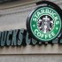 A sign is seen outside a Starbucks Coffee shop in central London