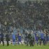 BATE Borisov's players, staff and supporters celebrate victory over Bayern Munich after their Champion's League Group F soccer match in Minsk's Dinamo Stadium