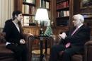 Taha, who was abducted and held by the Islamic State for three months, meets with Greek President Pavlopoulos