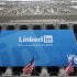 Banner announcing Linkedin Inc. listing on the New York Stock Exchange hangs on Exchange in New York
