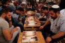 Dozens of Israelis and Palestinians, gathered for a backgammon tournament on August 31, 2016
