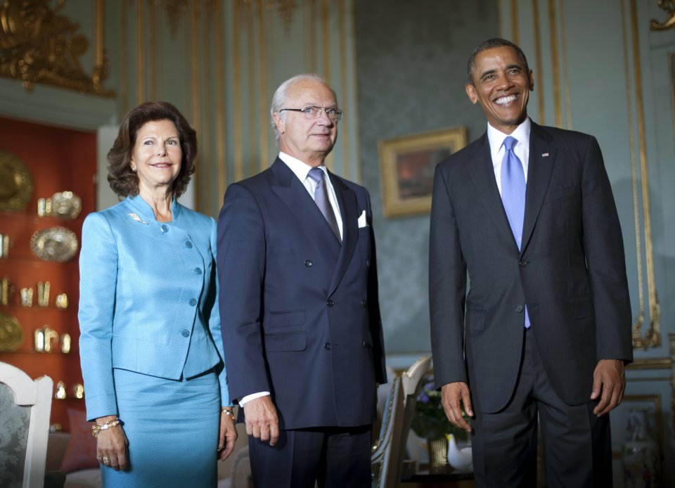 U.S. President Barack Obama, right, meets with Swedish King Carl XVI Gustaf, center, and Queen Silvia at the Royal Palace, Thursday, Sept. 5, 2013, in Stockholm, Sweden. (AP Photo/Pablo Martinez Monsivais)