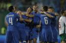 Italian players celebrate Bulgaria's own goal during a Euro 2016 Group H qualifying soccer match between Bulgaria and Italy at the Vassil Levski stadium in Sofia, Bulgaria, Saturday, March 28, 2015. (AP Photo/Vadim Ghirda)