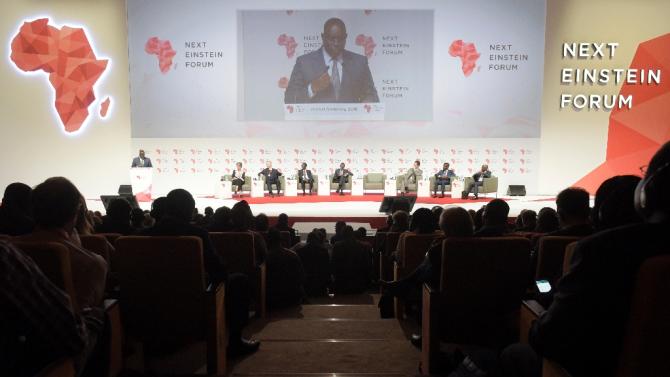 Senegal President Macky Sall (L) delivers a speech in Dakar during the opening of the &quot;Next Einstein Forum&quot; (NEF) on March 8, 2016