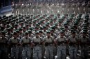 Iranian army's special forces march during the Army Day parade in Tehran on April 18, 2013