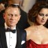 Actor Daniel Craig and actress Berenice Marlohe pose for photographers as they arrive for the royal world premiere of the new 007 film "Skyfall" at the Royal Albert Hall in London