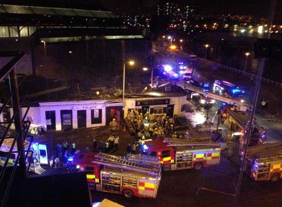Picture taken with permission from Jan Hollands Twitter feed JanHollands@Janney_h of the helicopter crash at the Clutha Bar in Glasgow Friday Nov. 29, 2013. The police helicopter crashed late Friday night into the roof of a popular pub in Glasgow, Scotland, leaving the building littered with debris and emergency crews scrambling to the scene. (AP Photo/Jan Hollands via PA) UNITED KINGDOM OUT - NO SALES - NO ARCHIVES