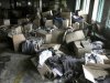 Boxes of garments lay near equipment charred in the fire that killed 112 workers Saturday at the Tazreen Fashions Ltd. factory,on the outskirts of Dhaha, Bangladesh, Wednesday, Nov. 28, 2012. Garments and documents left behind in the factory show it was used by a host of major American and European retailers, though at least one of them — Wal-Mart — had been aware of safety problems. Wal-Mart blames a supplier for using Tazreen Fashions without its knowledge. (AP Photo/Ashraful Alam Tito)