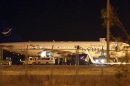 A Syrian passenger plane which was forced to land sits at Esenboga airport in Ankara