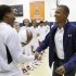 Obama greets Catchings and other members of the U.S. Olympic women's basketball team after their exhibition game against Brazil in Washington