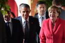 French President Francois Hollande, US President Barack Obama and Germany's Chancellor Angela Merkel, from left, arrive for a working session of the G-7 summit at Schloss Elmau hotel near Garmisch-Partenkirchen, southern Germany, Monday June 8, 2015. (John MacDougall/Pool Photo via AP)