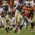 Florida State running back Devonta Freeman (8) runs for a first down past Miami linebacker Jimmy Gaines (59) during the second half of an NCAA college football game, Saturday, Oct. 20, 2012, in Miami. (AP Photo/Lynne Sladky)