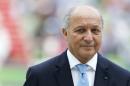French Foreign Affairs Minister Laurent Fabius attends the jumping first round third competition at the World Equestrian Games at the d'Ornano stadium in Caen