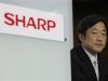 Sharp Corp President Katayama looks on during a news conference in Tokyo