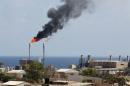 Voicing alarm at the deteriorating security situation in the North African state, the allies said Libya was on the brink of economic implosion because of a collapse in its production and the sliding value of crude