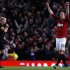Manchester United's Robin Van Persie celebrates as referee Anthony Taylor blows the final whistle for their English Premier League soccer match against Aston Villa at Old Trafford in Manchester