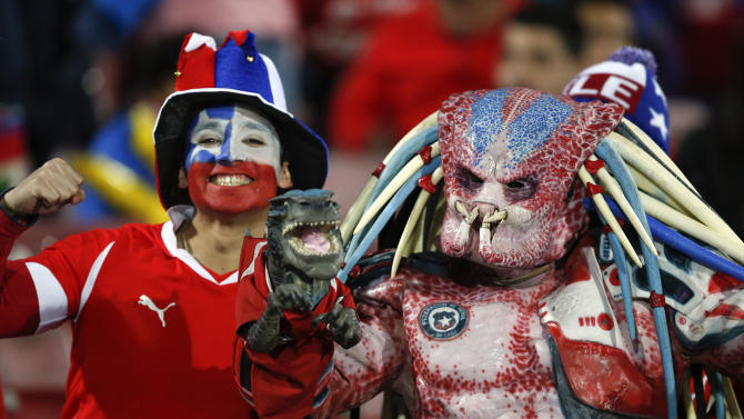 Chile&#39;s fans pose during a Copa America semifinal soccer match between Chile and Peru at the National Stadium in Santiago, Chile, Monday, June 29, 2015. (AP Photo/Andre Penner)
