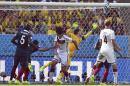 Germany's Mats Hummels, centrer, scores the opening goal during the World Cup quarterfinal soccer match between Germany and France at the Maracana Stadium in Rio de Janeiro, Brazil, Friday, July 4, 2014. (AP Photo/Martin Meissner)