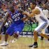 Philadelphia 76ers Jason Richardson drives on the Denver Nuggets Andre Miller during their NBA basketball game in Philadelphia