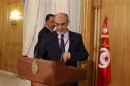 Tunisia's Prime Minister Hamadi Jebali arrives to address a news conference in Tunis