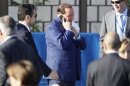 Il leader del Pdl Silvio Berlusconi parla al telefonino