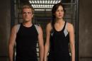 This image released by Lionsgate shows Josh Hutcherson as Peeta Mellark, left, and Jennifer Lawrence as Katniss Everdeen in a scene from "The Hunger Games: Catching Fire." The movie opens in theaters Friday, Nov. 22, 2013, in what's expected to be one of the year's biggest box-office debuts. (AP Photo/Lionsgate, Murray Close)