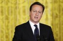 Britain's PM Cameron responds to a question during a joint news conference with U.S. President Obama in Washington