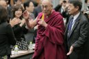 Tibetan spiritual leader the Dalai Lama arrives at a seminar held by Japanese Diet members in Tokyo, Tuesday, Nov. 13, 2012. (AP Photo/Itsuo Inouye)