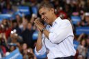 U.S. President Obama gestures at a campaign event at Lima Senior High School in Ohio