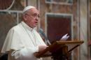Pope Francis addresses ambassadors to the Holy See at the Vatican on January 13, 2014