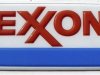 Exxon corporate logo is pictured at a gas station in Arlington