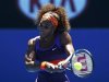 Serena Williams of the U.S. hits a return to Edina Gallovits-Hall of Romania during their women's singles match at the Australian Open tennis tournament in Melbourne