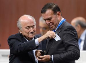 Sepp Blatter (left) gives a business card to South&nbsp;&hellip;