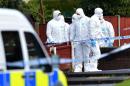 File picture for illustration only shows police forensic officers at a crime scene in September, 2012