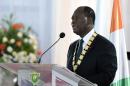 Ivory Coast's President Alassane Ouattara talks during the swearing-in ceremony held at the Presidential Palace in Abidjan on November 3, 2015