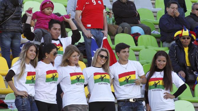 Bolivia fans pose as they await the start of their team&#39;s first round Copa America 2015 soccer match against Ecuador at Estadio Elias Figueroa Brander in Valparaiso