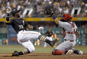 McCutchen homers in 14th, Pirates beat Cards 6-5