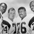 FILE - This 1964 handout provided by NFL photos,  shows the Los Angeles Rams defensive front four, known as the "Fearsome Foursome." from left to right are Lamar Lundy (85), Merlin Olsen (74), Rosey Grier (76), and Deacon Jones (75). David "Deacon" Jones, a Hall of Fame defensive end credited with terming the word sack for how he knocked down quarterbacks, has died. He was 74.  The Washington Redskins said that Jones died Monday night June 3, 2013 of natural causes at his home in Southern California. (AP Photo/NFL Photos) NO SALES