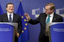Irish Prime Minister Enda Kenny, right, and European Commission President Jose Manuel Barroso participate in a media conference at EU headquarters in Brussels on Thursday, June 27, 2013. The European Union may soon have a new seven-year budget after a surprise breakthrough deal was announced Thursday morning. European Commission President Jose Manuel Barroso announced the agreement Thursday after late-night talks with the president of the European Parliament and other officials from EU member states. Barroso said it includes more flexibility than earlier versions. (AP Photo/Virginia Mayo)