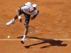 Djokovic of Serbia serves to Berdych of Czech Republic during their men's singles quarter final match at the Rome Masters tennis tournament
