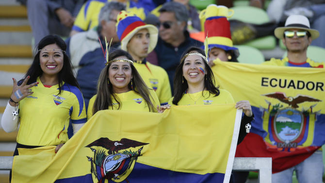 Ecuador&#39;s fans pose with their national flag before the start of a Copa America Group A soccer match between Ecuador and Bolivia at Elias Figueroa stadium in Valparaiso, Chile, Monday, June 15, 2015. (AP Photo/Jorge Saenz)