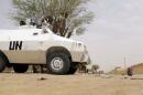United Nations soldiers patrol the city of Kidal in northern Mali, where four migrants were killed when gunmen attacked the lorry they were traveling in, a source said on November 30 2015